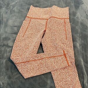 Athleta Rust Leopard Salutation Stash II High-Rise Leggings